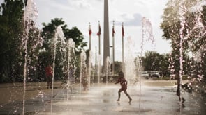 kids in the water fountain